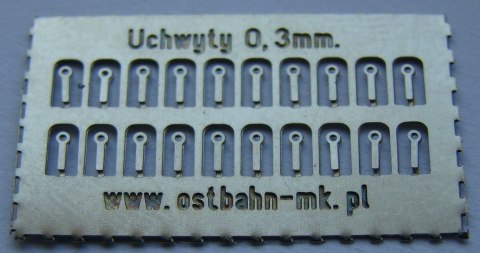 Uchwyty na poręcz, trąbkę 0,3 mm