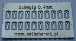 Uchwyty na poręcz, trąbkę 0,4 mm