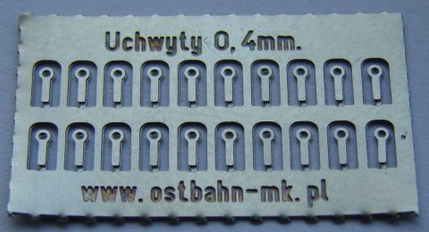 Uchwyty na poręcz, trąbkę 0,4 mm